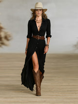 Robe longue ceinturée à revers plissés