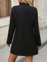 Manteau élégant à col droit et boutons classiques