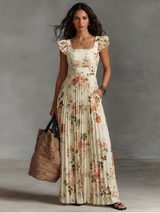 Élégance Romantique – Robe Longue Plissée Fleurie