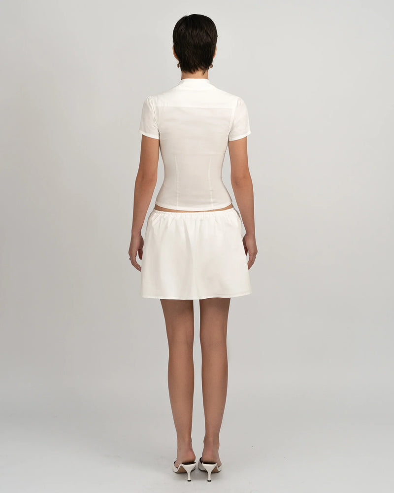 Vue arrière de l’ensemble blanc femme ALBA, top manches courtes