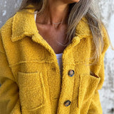 Veste boutonnée en maille douce avec poches plaquées