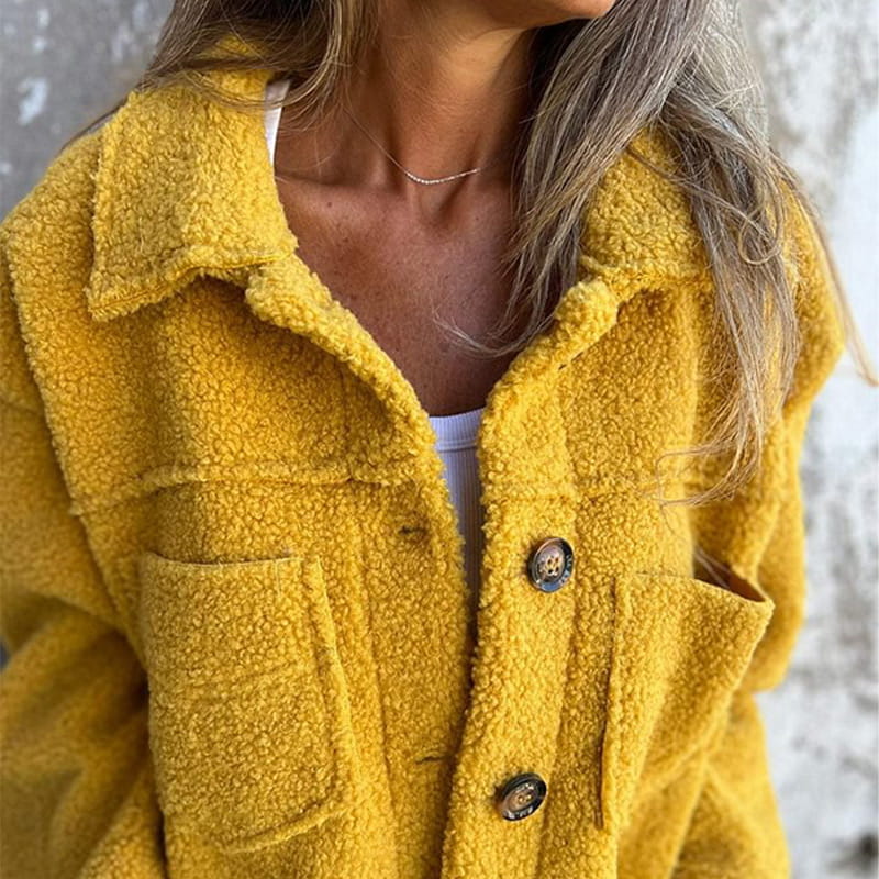 Veste boutonnée en maille douce avec poches plaquées