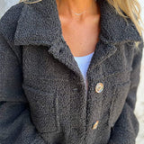 Veste boutonnée en maille douce avec poches plaquées