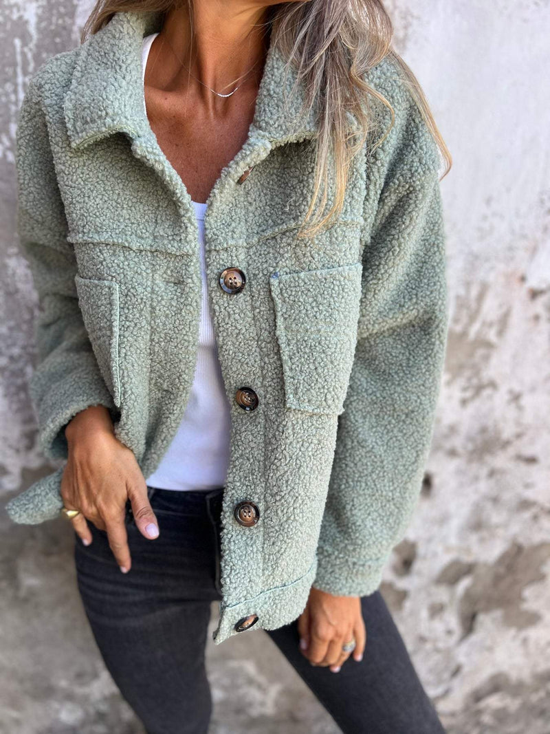 Veste boutonnée en maille douce avec poches plaquées