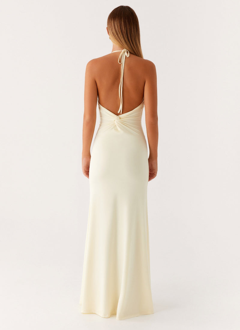 Robe longue dos nu blanche élégante avec coupe ouverte au dos