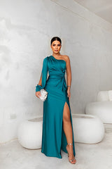 Vue de profil robe longue femme petrol, coupe fluide avec fente élégante