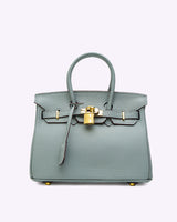 Sac bleu clair Armure Urbaine – style doux et raffiné, finition dorée