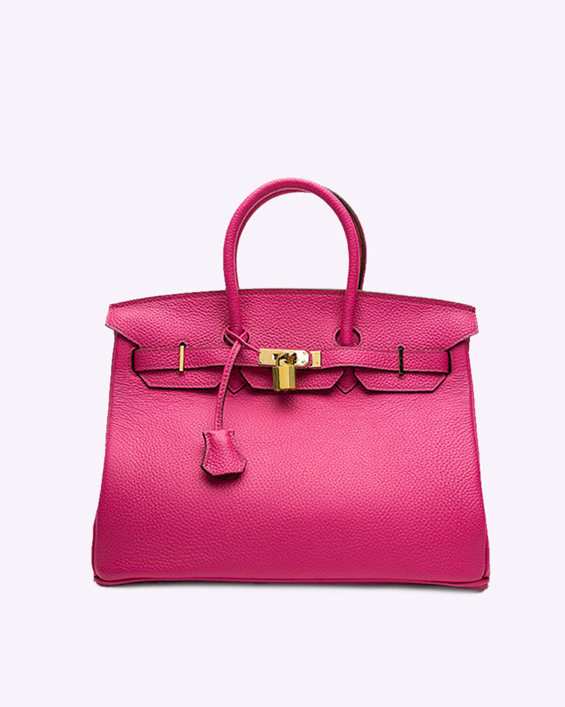 Sac rose vif Armure Urbaine – design féminin avec cadenas doré
