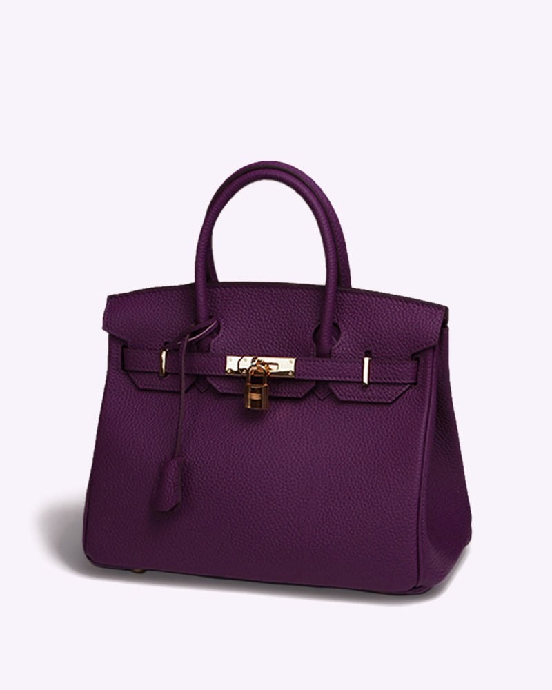 Sac violet foncé Armure Urbaine – cuir structuré et élégant, vue studio