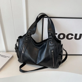 Sac noir femme AUDREY en position couchée sur une table